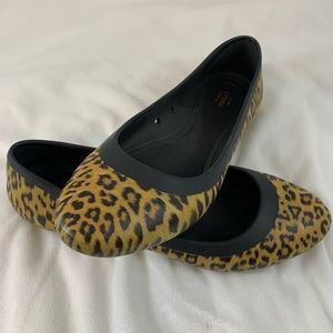 Crocs cheetah print shoes.
